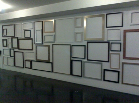 Picture frames hung in Artist Studio
