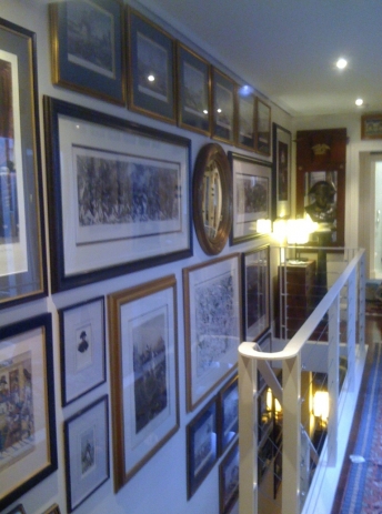 Collection of Napoleonic works hung in stairwell